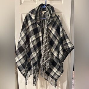 Sweater wrap with hood. Plaid exterior, houndstooth interior.